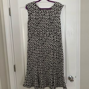 Black and white sleeveless knee length dress